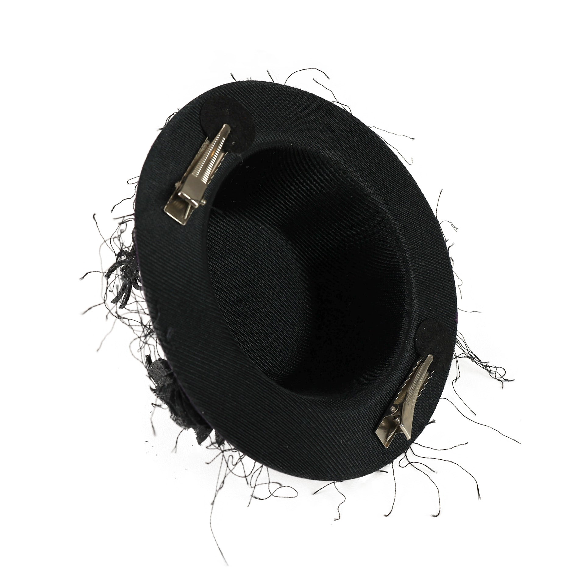 Purple mini hat with black flower and spiders