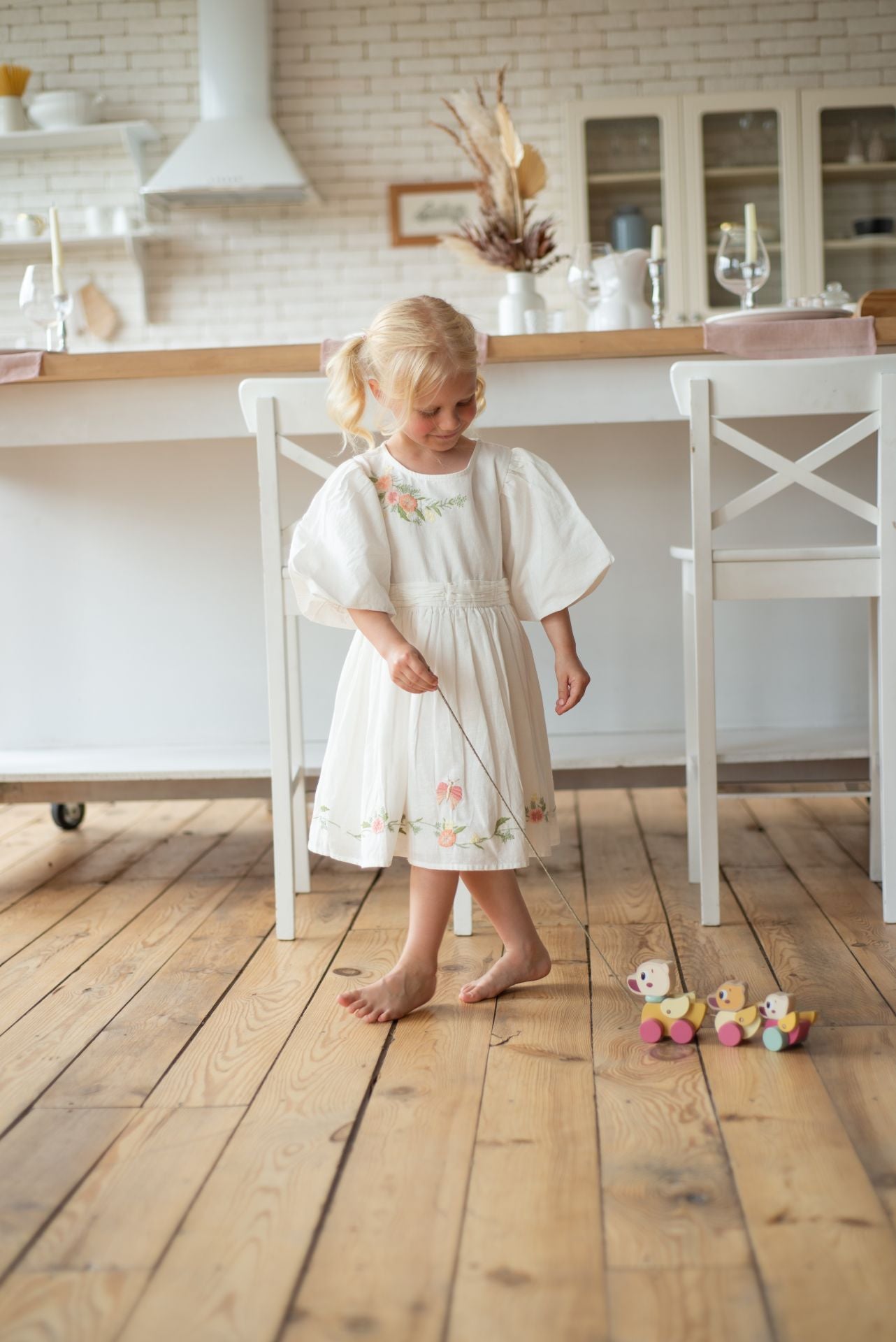 CUBIKA pastel wooden pull-along ducklings