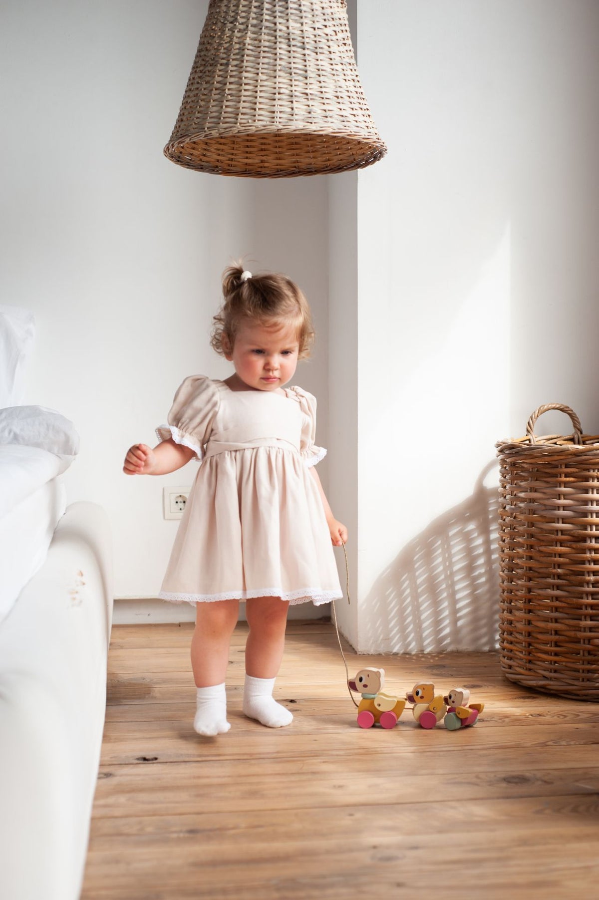 CUBIKA pastel wooden pull-along ducklings