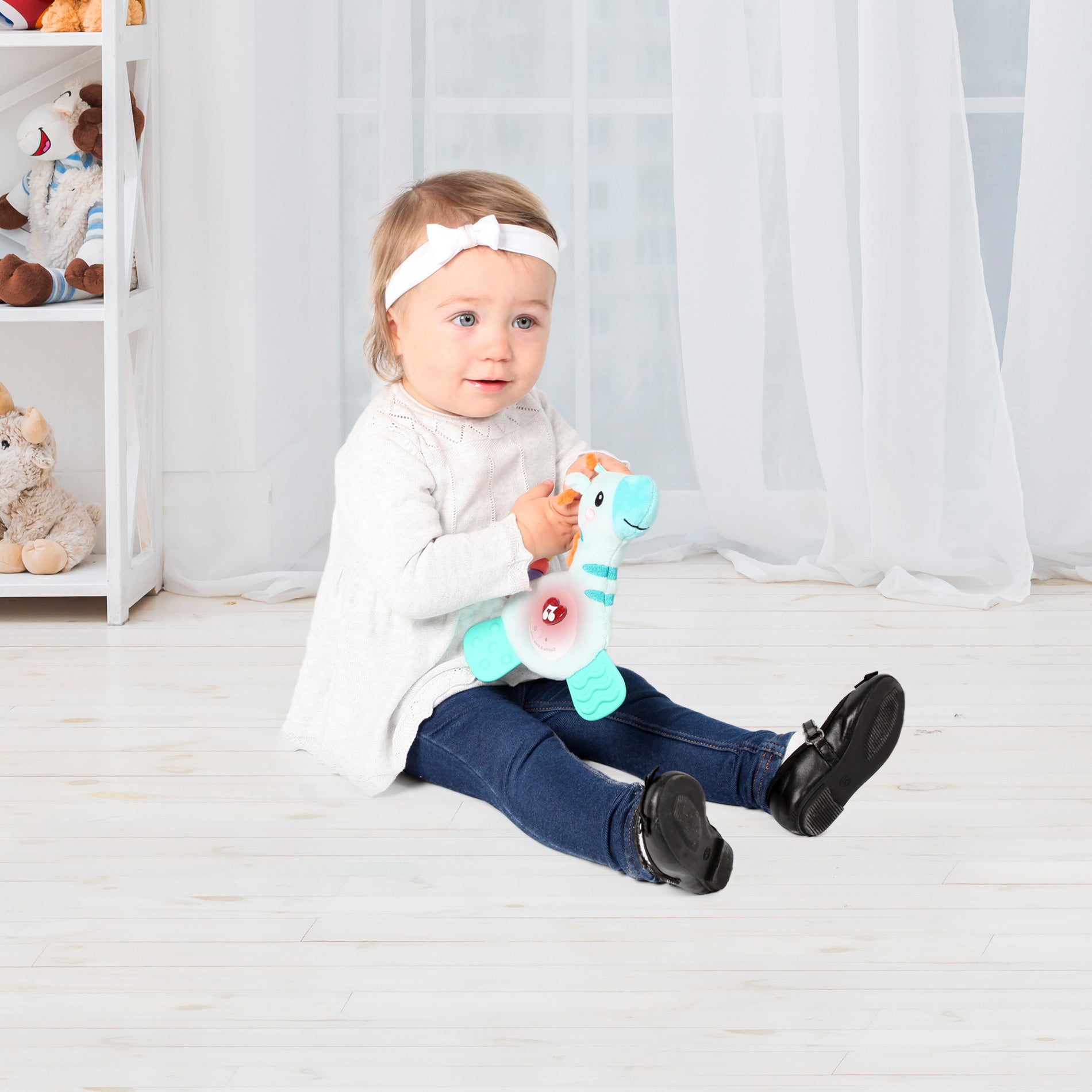 Plush giraffe teether with lights and sounds