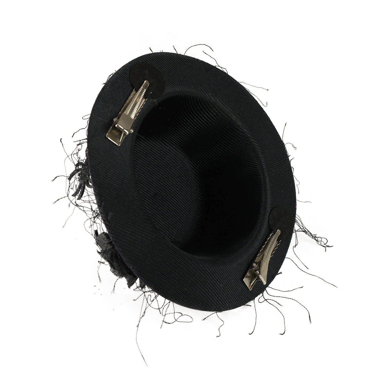Purple mini hat with black flower and spiders