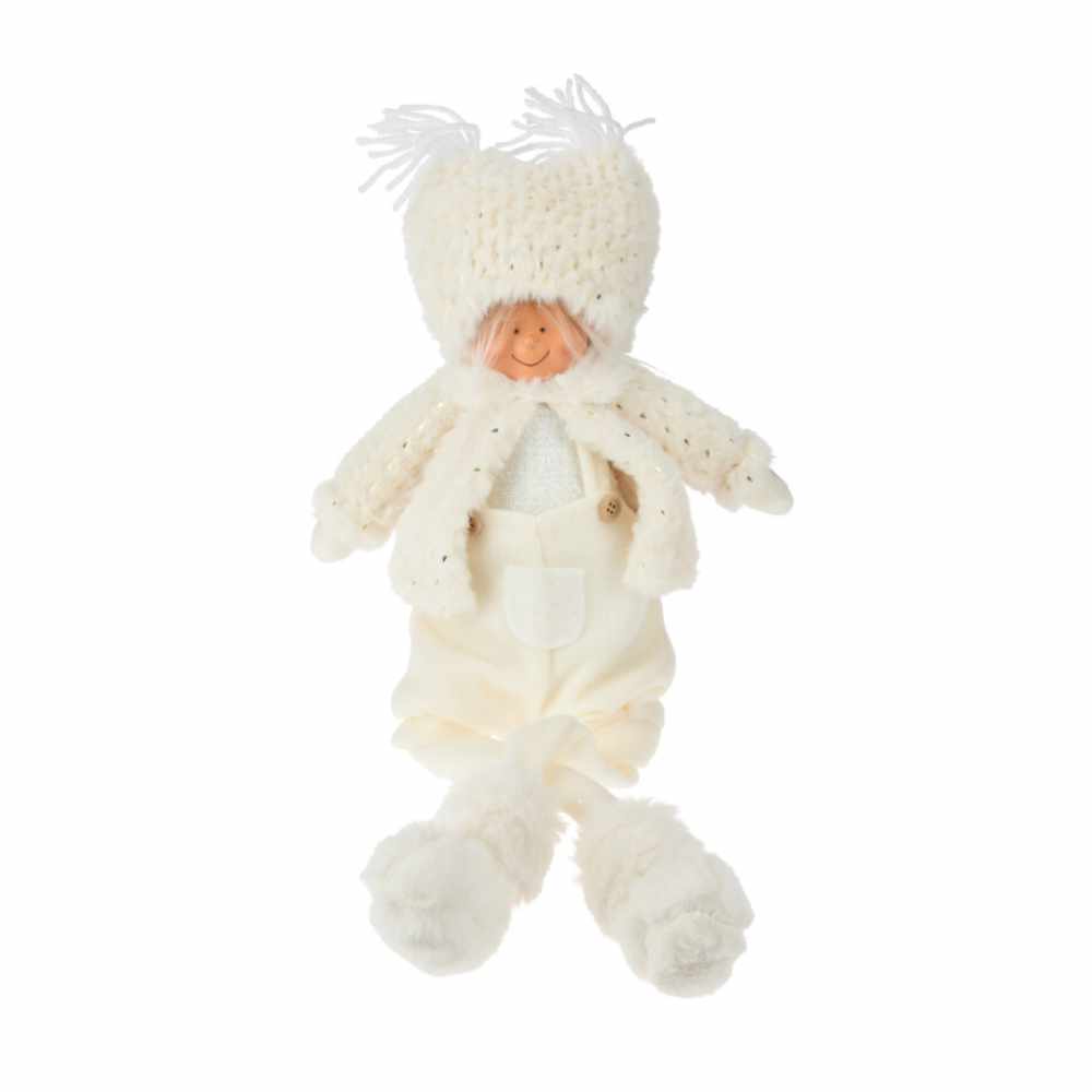 Seated Boy in White Christmas Decoration